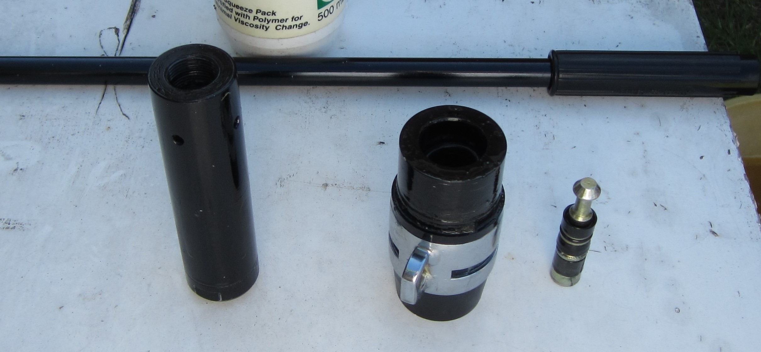 Bazooka rear ends of muzzle, nose cone and piston.JPG