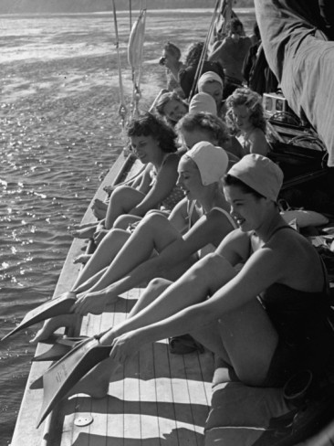 peter-stackpole-santa-monica-life-guards-party-aboard-boat-girls-putting-on-fins-to-go-diving.jpg