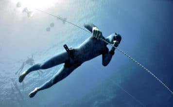 Freediver makes preparation dive in Blue Hole, Dahab, Egypt
